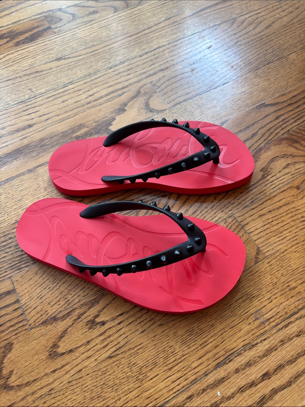 Christian Louboutin Red Rubber Flip Flops with Black Studded Straps